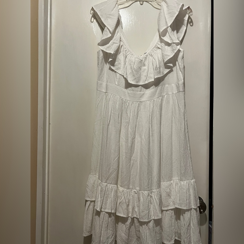 Calvin Klein White Ruffled V Neck Dress.